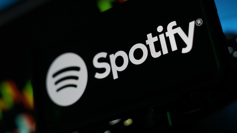 The Spotify logo on a digital screen