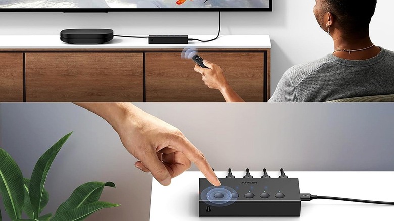 UGREEN HDMI switch in use to connect media devices to TV.