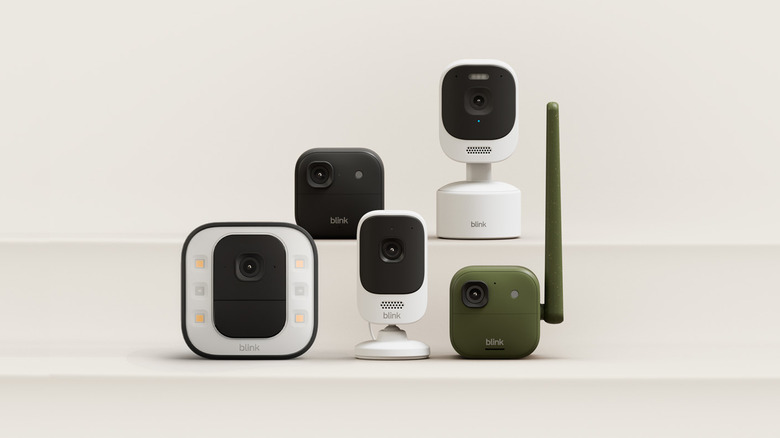 Blink's new security camera lineup on a creme-coloured surface