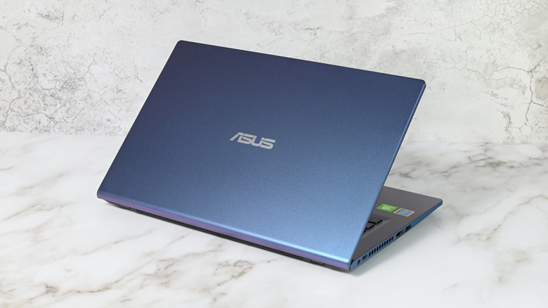 Asus laptop with its lid towards the camera, logo facing