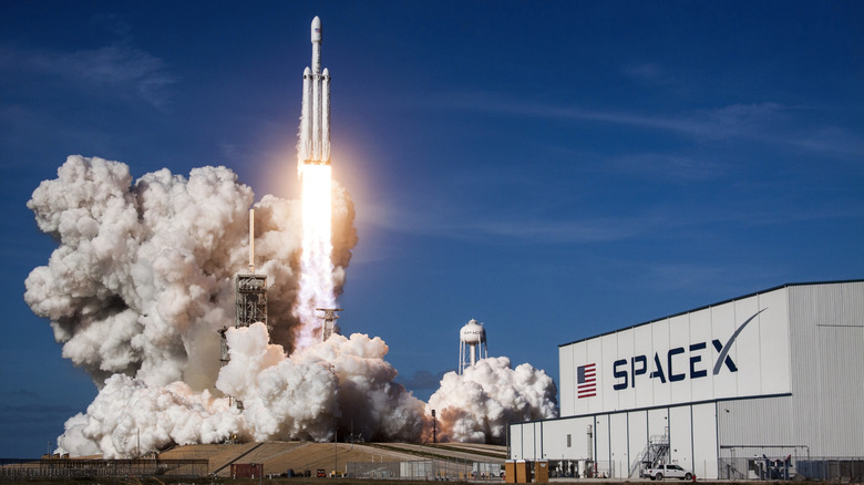 A rocket launching near the SpaceX building