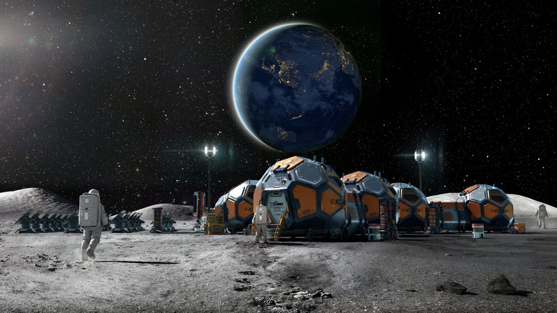 Astronauts walking on the moon near a lunar colony