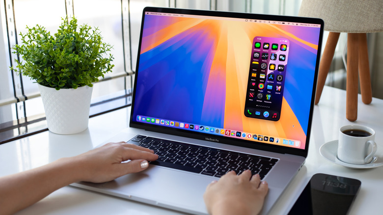 A person using a MacBook Pro.