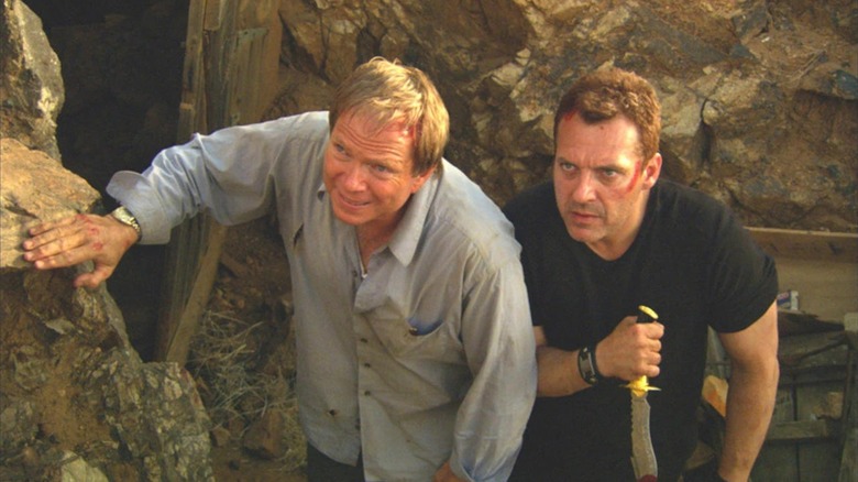 Grant and Joey standing next to each other and looking exhausted