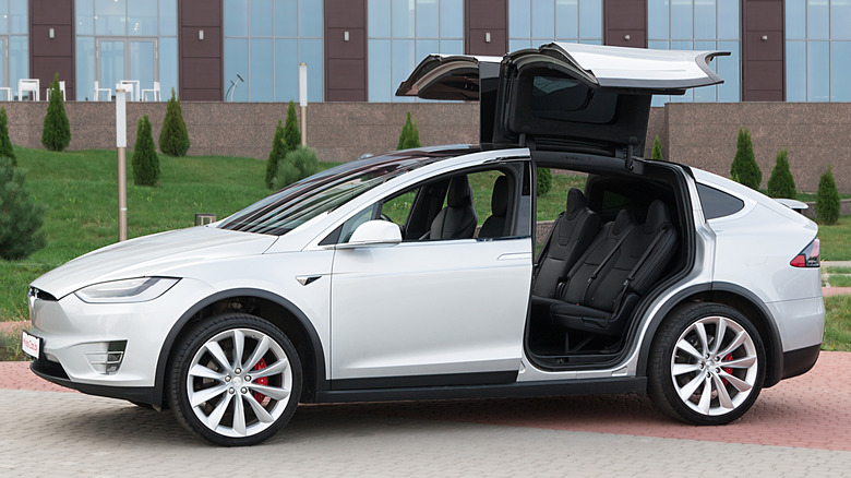 Tesla Model X parked with its doors open