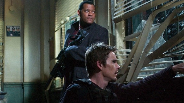 Marion Bishop and Jake Roenick looking out a window in "Assault on Precinct 13."