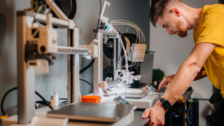 Man working on 3D printing project