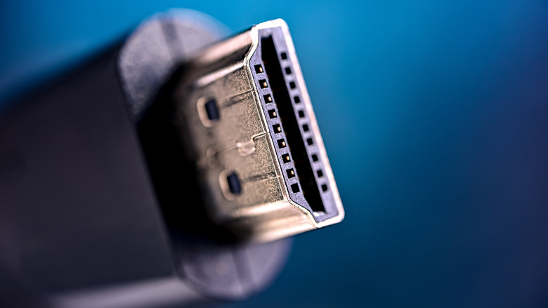 Closeup of HDMI cable end on blue background