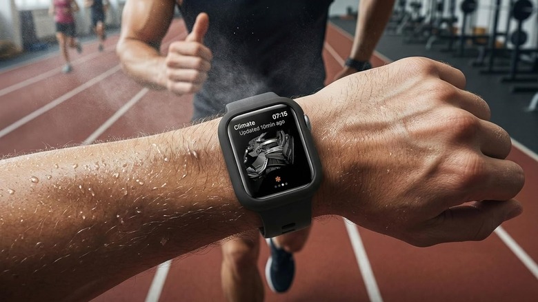 Close-up of person checking Apple Watch with protective case during workout