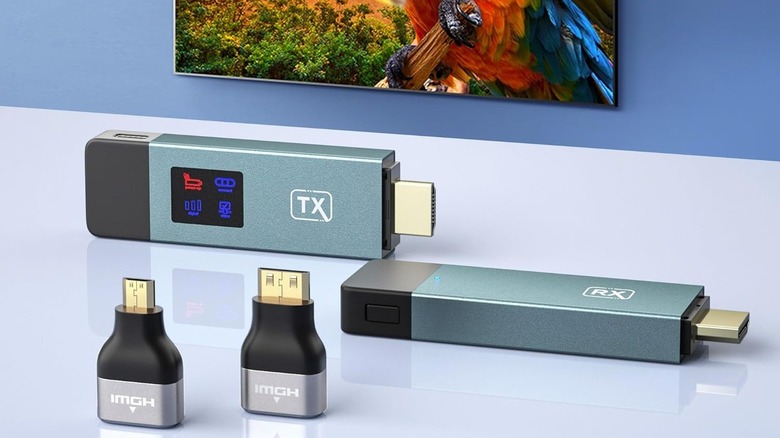 Braidol wireless HDMI transmitter on a table with HDMI adapters