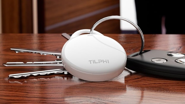 A Tilphi Air Tracker attached to a key ring.