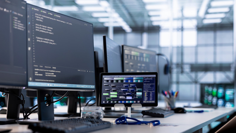 Multiple monitors placed on a desk