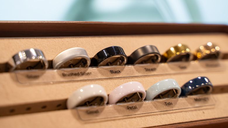 Store display of Oura smart rings in several different colors