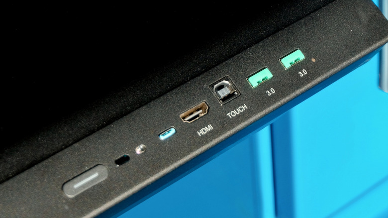 The bottom of a black monitor displaying its various ports