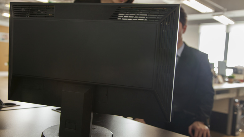 Computer monitor on non-adjustable mount