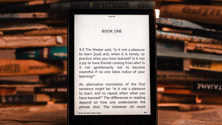 close-up of kindle with book open showing text on screen