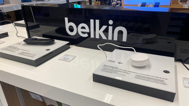 A Belkin display in a store focused on two wireless charging pads