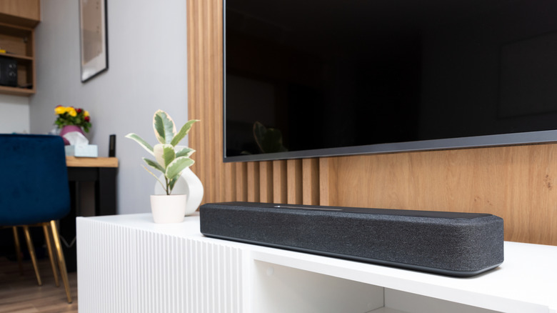 Soundbar sitting below TV