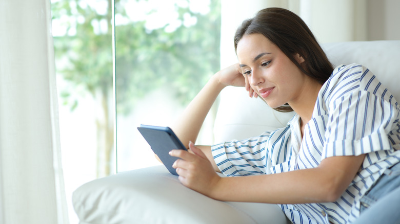 Woman reading from an ereader