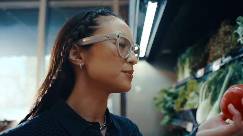 A person wearing Ray-Ban smart glasses, looking at produce