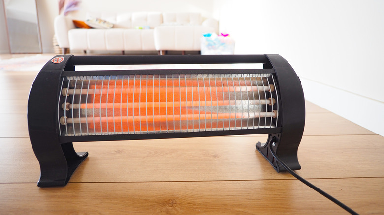 An indoor space heater in a bright living room