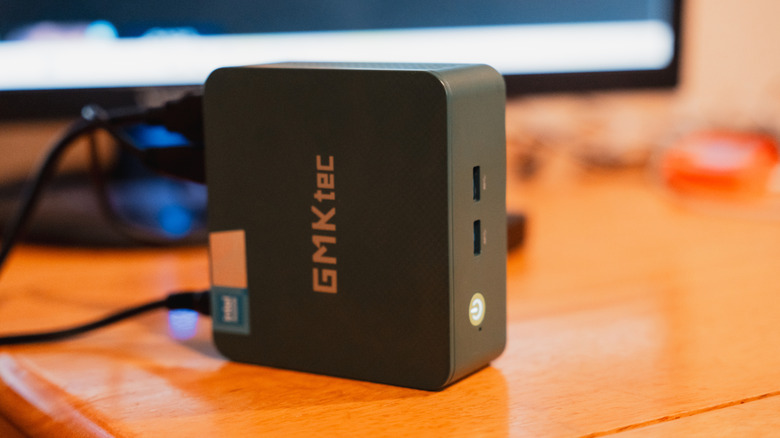 A GMKtech mini PC on a desk