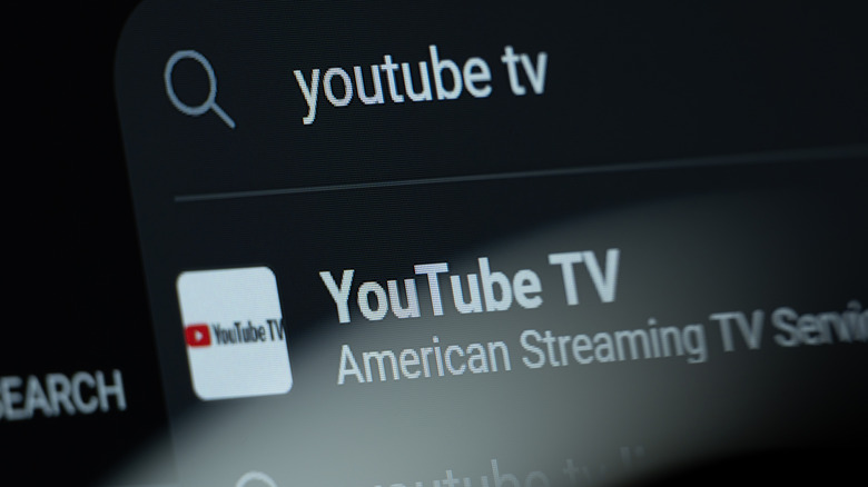 A closeup of a search result showing YouTube TV on a screen.