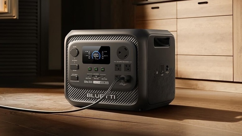 The Bluetti Elite 300 on wooden floor connected delivering AC power