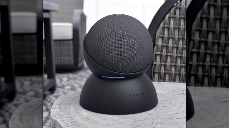 The Mission Cables Battery Base for Amazon Echo Dot on a wooden surface