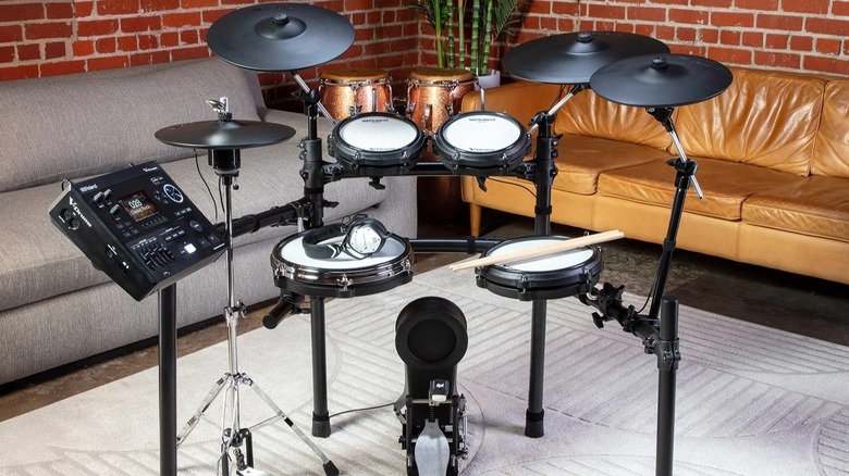 Roland drum kit sitting on carpet