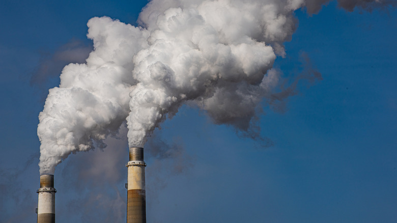 Smokestacks at a coal-fired power plant spewing smoke