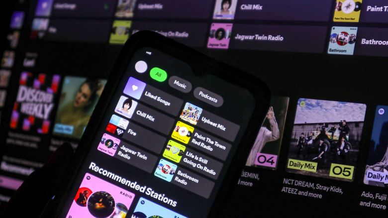 Smartphone with the Spotify home page pulled up
