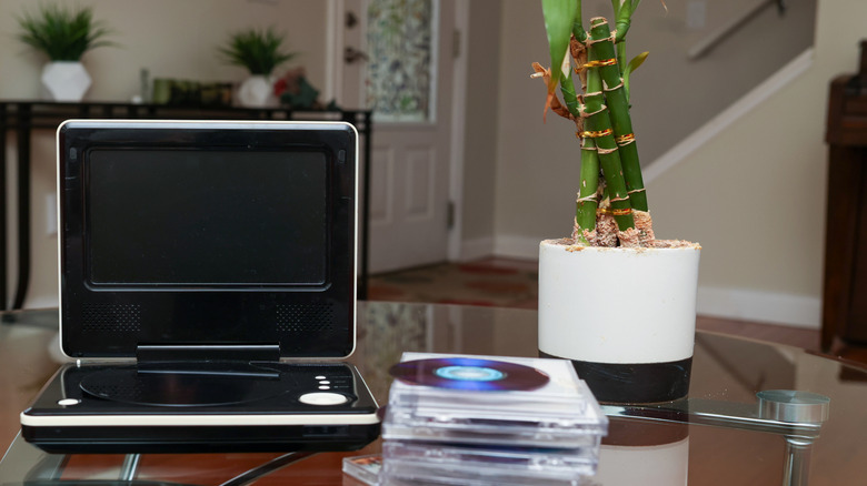 Portable DVD player on table