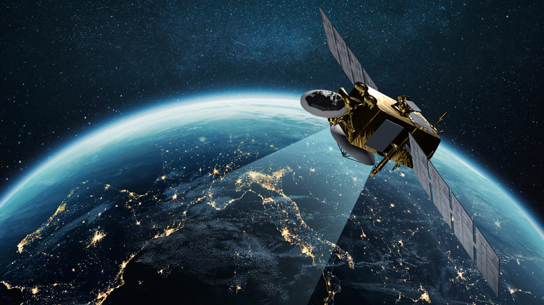 satellite sending a signal down to Earth