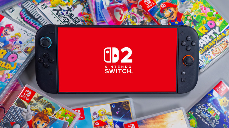 Undocked Nintendo Switch 2 surrounded by games
