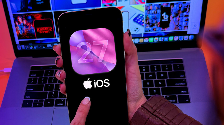 Close-up of an iPhone 17 Pro display showing iOS 27 logo