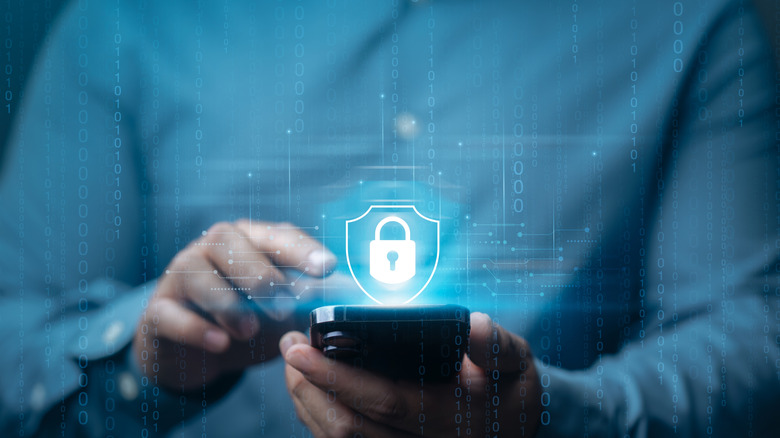 Person using photo with lock graphic indicating privacy issues