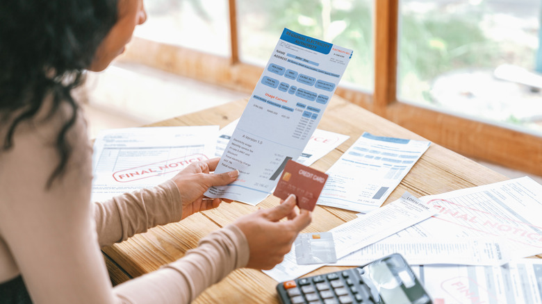 A person reviewing an energy bill