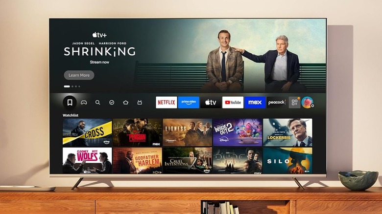 A promotional photo for the Hisense 32-inch Class A4 Series 1080-p Smart Fire TV, the TV is displaying the Fire TV Home screen