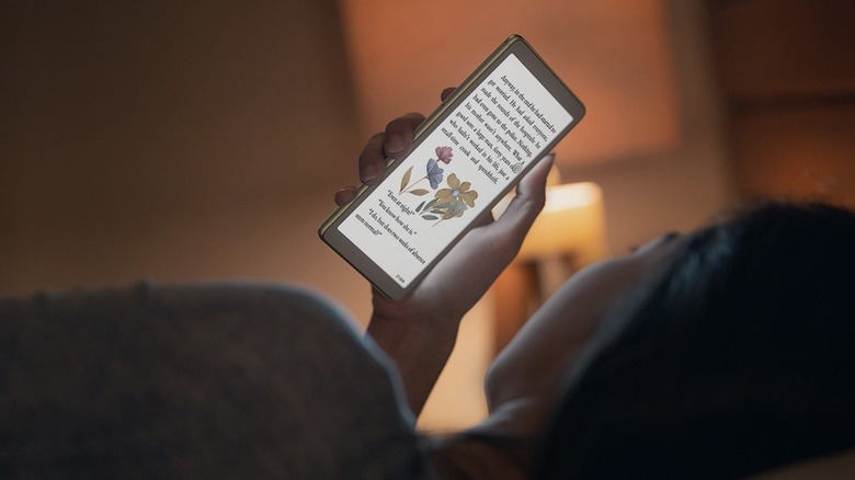 Woman reading in bed on Viwoods AiPaper Reader C
