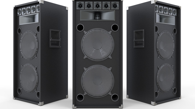 Three large audio speakers