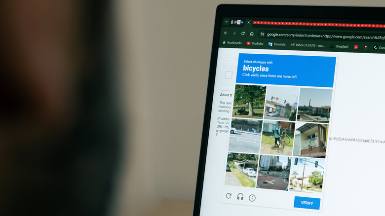 A photo grid CAPTCHA on a computer screen