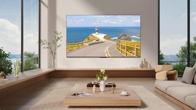 The iFFALCON U85 TV mounted on a wall in a living room