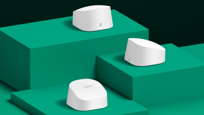 Eero 6 Mesh Routers on green platforms