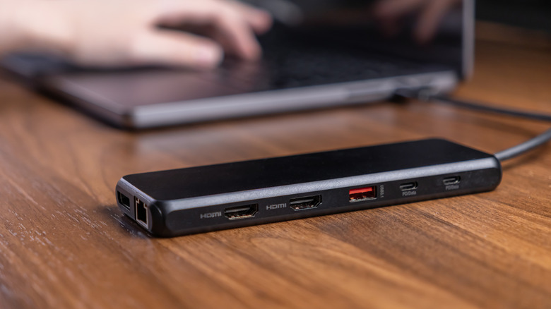 Close up of a USB hub with HDMI and additional ports incorporated.