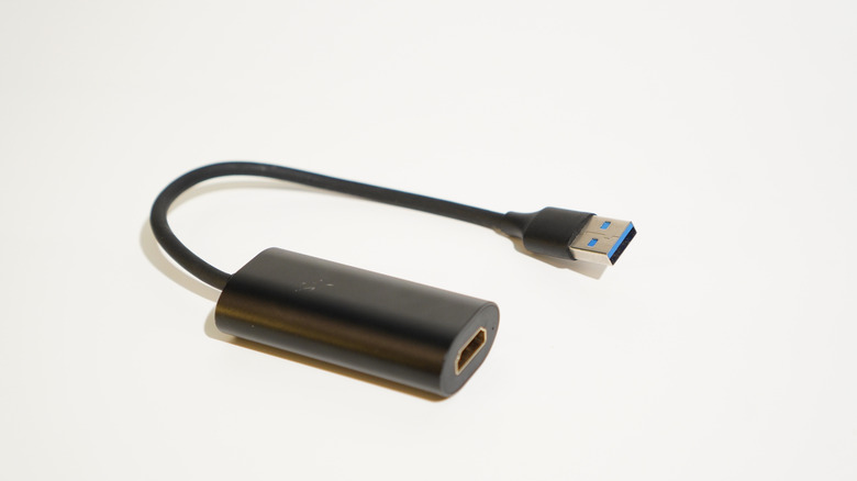 A USB Type-A to HDMI adapter for visual conversion.