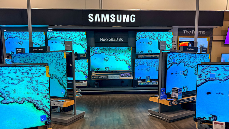 A display of Samsung TVs at a retail outlet.