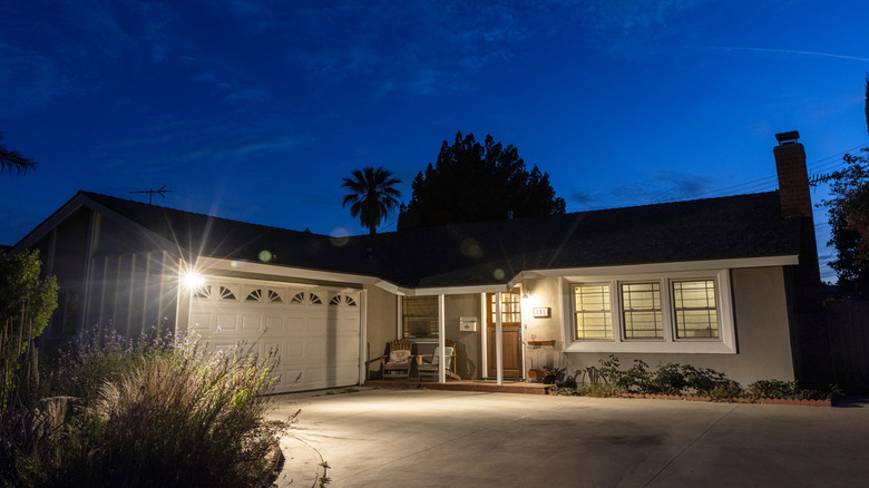 House with lights on at night