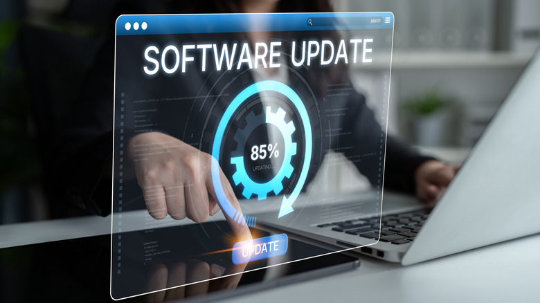A hologram screen showing a software update 85% complete