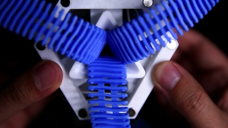 A top-down view at the 3D printed MIT Y-zipper prototype showing its components.